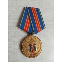 Медаль. 65 лет Службе связи МВД РФ. За заслуги.