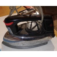 Старый утюг рабочий